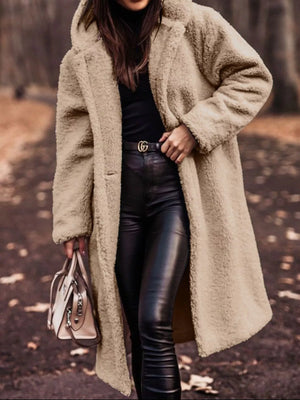 Longline teddy bear coat in camel with button closure and hood.