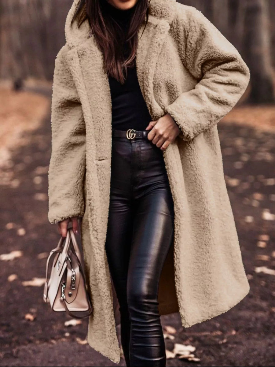 Longline teddy bear coat in camel with button closure and hood.