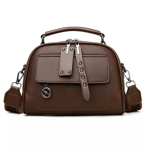 Brown structured crossbody bag with adjustable strap and silver kangaroo charm.