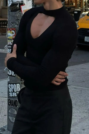 Black ribbed knit top with a long sleeve and a daring keyhole cutout neckline.