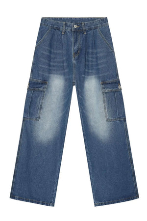 Faded denim cargo pants in medium wash with pleated front and button flap pockets.