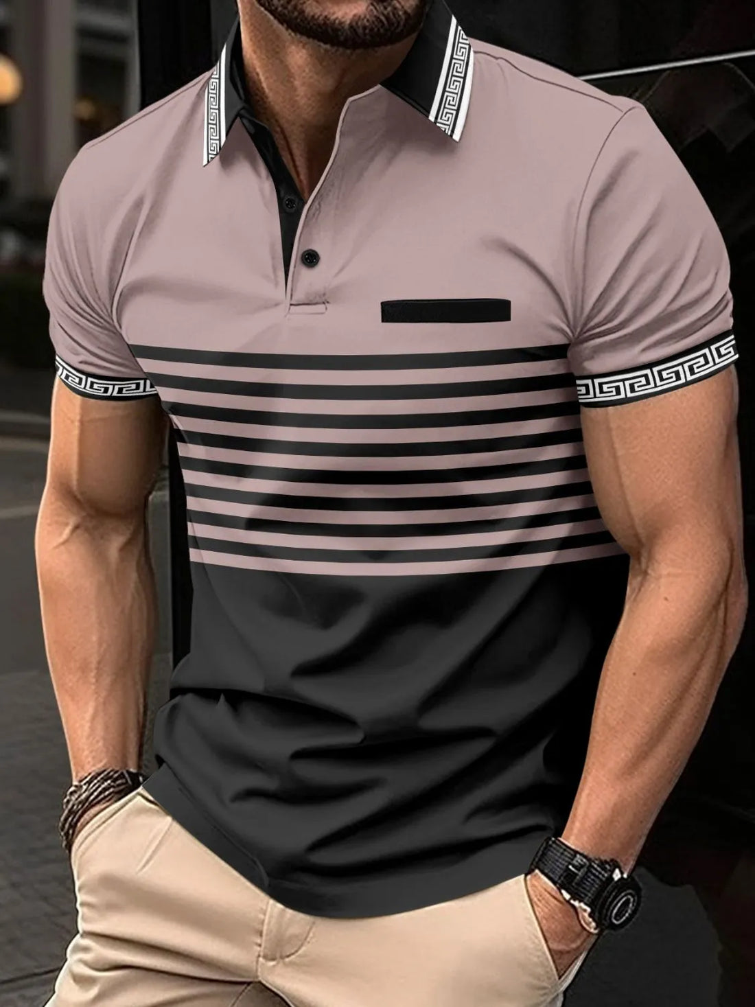 Geometric stripe polo shirt in dusty pink and black with contrast trim on collar and sleeves.