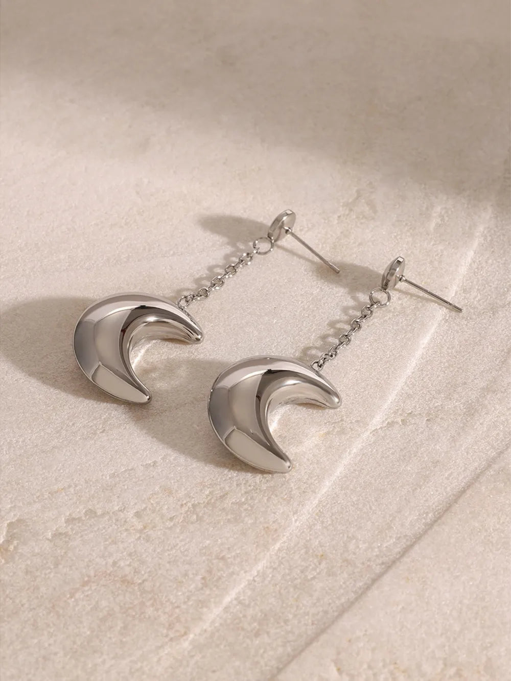 Silver celestial crescent drop earrings with chain detail