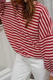 95% polyester, 5% elastane Care instructions: Machine wash cold sweatshirt in Stripe with relaxed silhouette