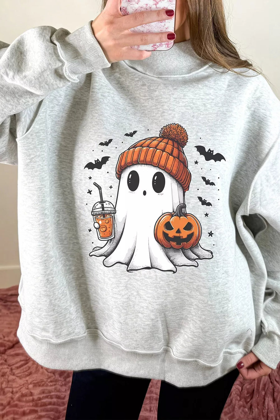 black sweatshirt with tunic-length and pullover