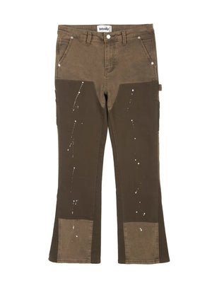 Split panel bootcut jeans in coffee brown with white paint splatters and a distressed look.