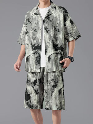 Men's casual set with tie-dye pattern, short sleeves, and button-up shirt.