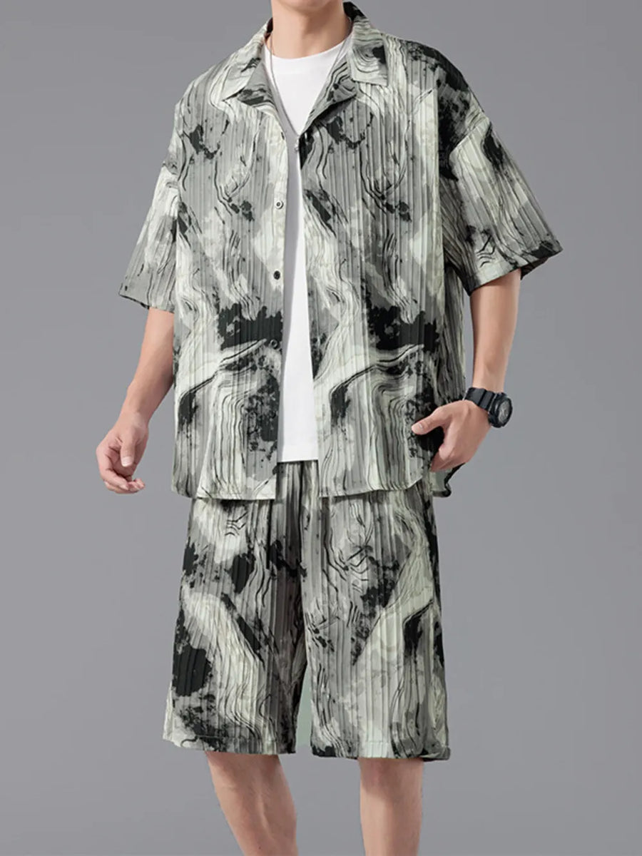Men's casual set with tie-dye pattern, short sleeves, and button-up shirt.