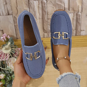 Blue mesh slip-on loafers with gold buckle detail, casual breathable flats.