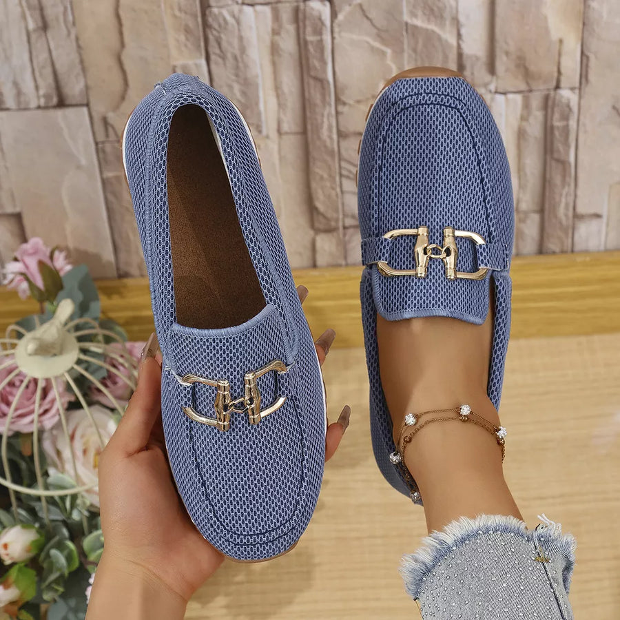 Blue mesh slip-on loafers with gold buckle detail, casual breathable flats.