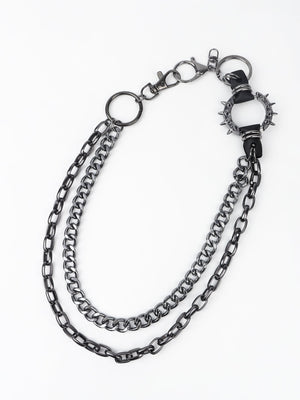 Black spiked chain harness belt with aluminum hardware and multiple clasps.