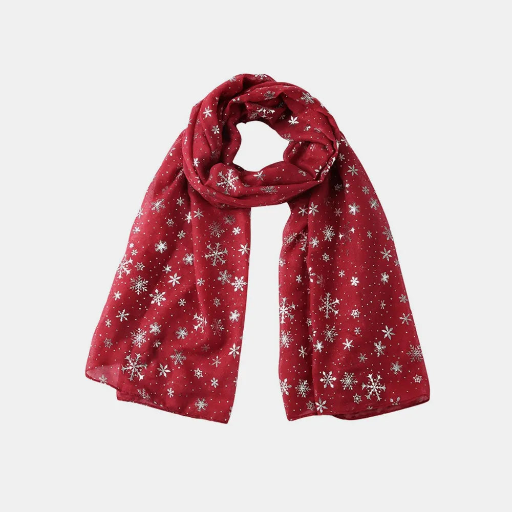 Red scarf with silver snowflake print