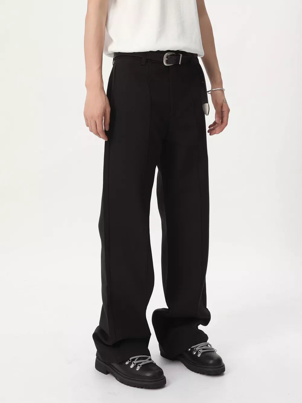 Black wide-leg sweatpants with adjustable waist and front seam detail.