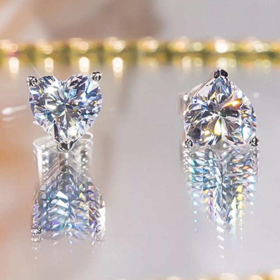925 sterling silver,Moissanite Carat weight: 2ct Care instructions: Avoid wearin earrings in Silver with stud silhouette
