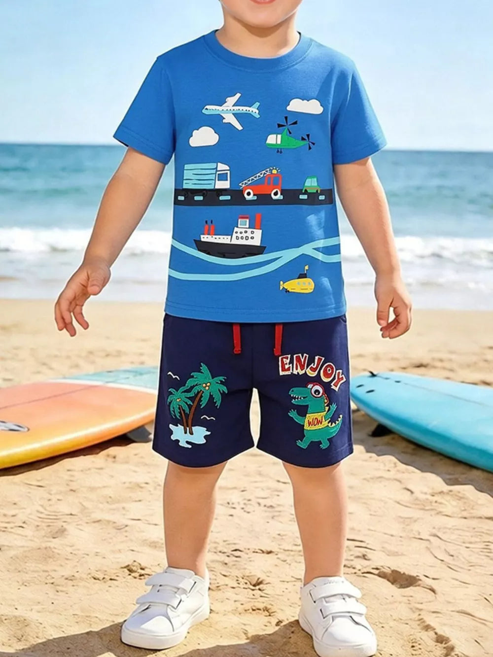 Boys' blue cotton t-shirt and navy shorts set with transportation and dinosaur prints.