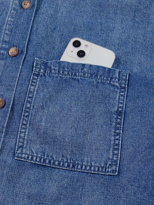 button-up shirt in Dusty Blue with chest pocket and hip-length