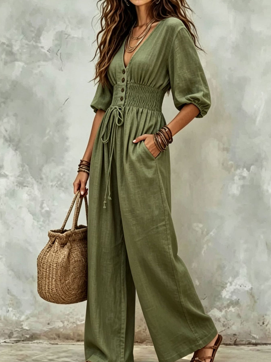 navy blue jumpsuit with pocketed and elbow sleeve