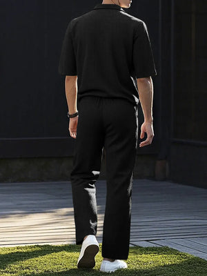 Black textured short sleeve polo shirt and matching drawstring pants set.