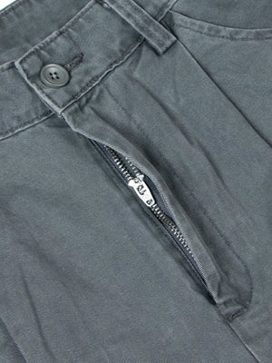 Grey cotton sweatpants with button closure and zipper detail.