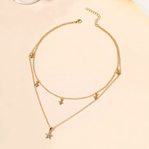 Gold double layer necklace with star charms and clear crystals