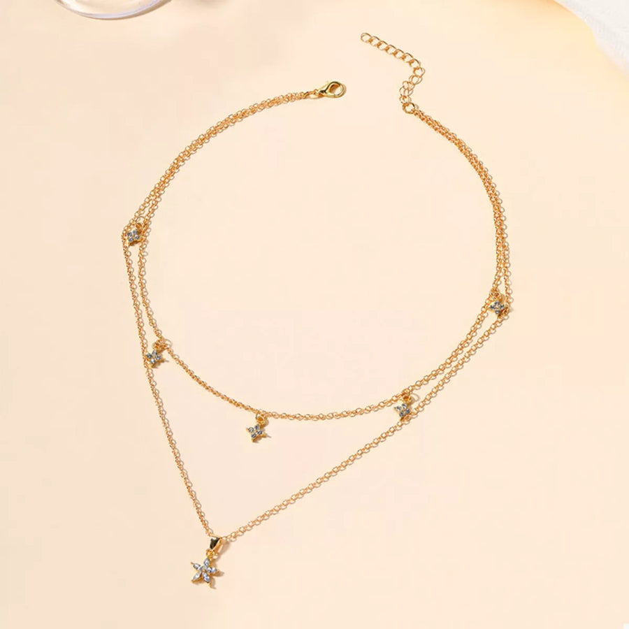 Gold double layer necklace with star charms and clear crystals