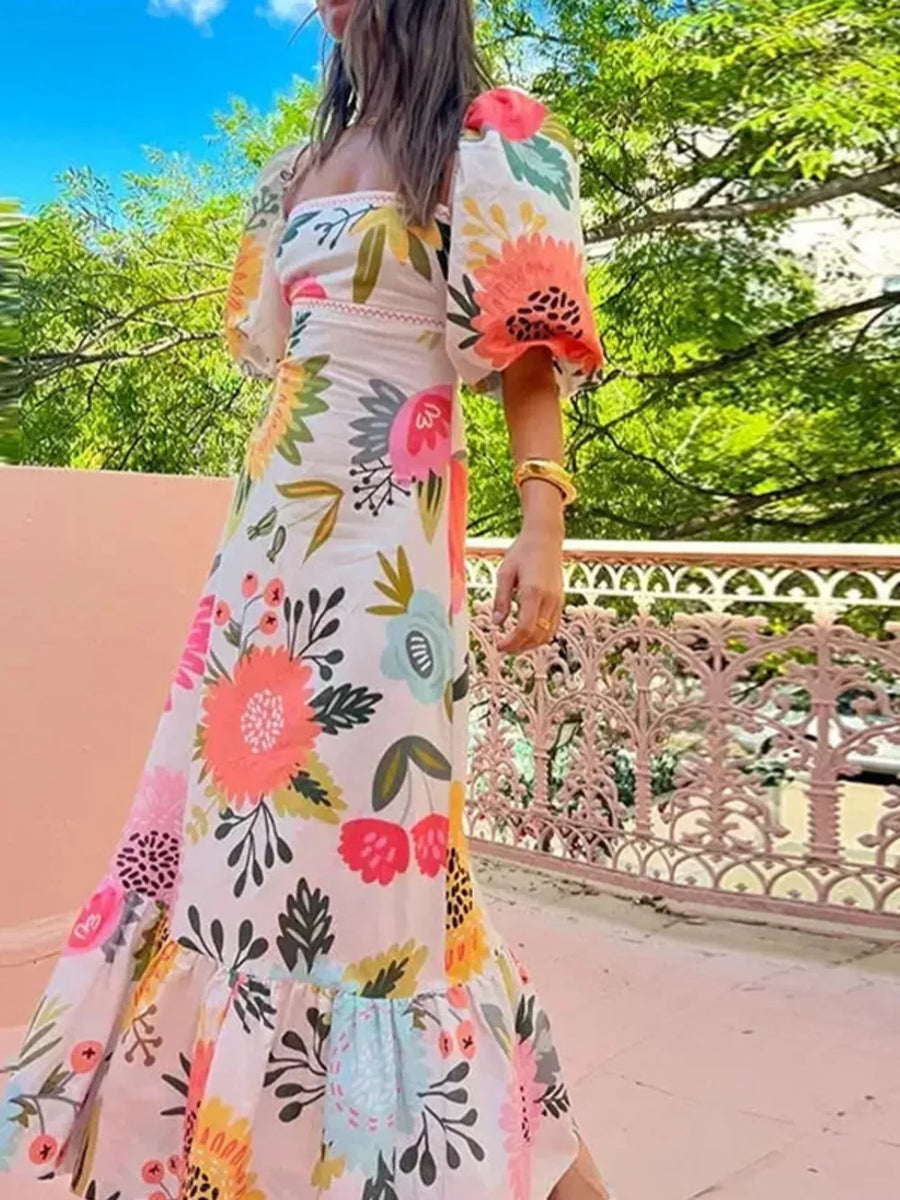 yellow maxi dress featuring puff sleeve and floral