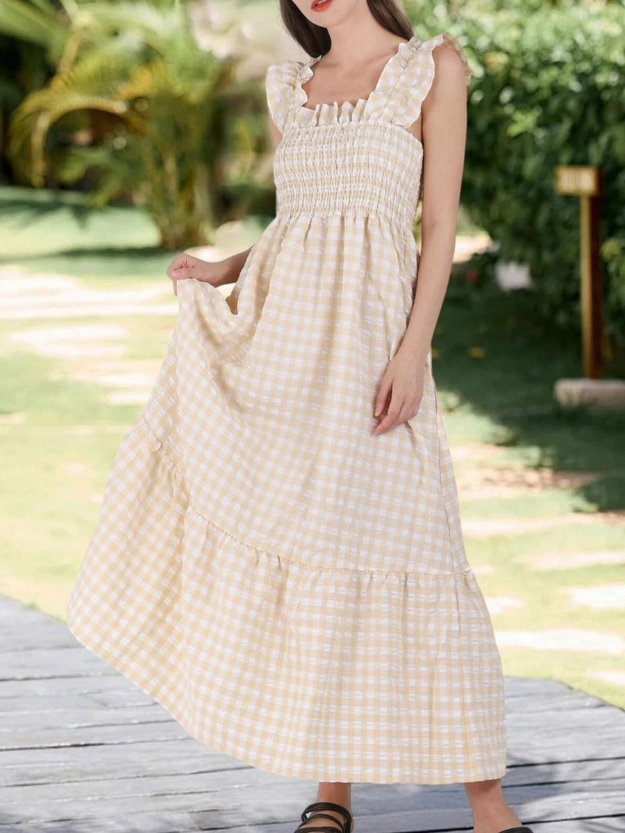 Apricot gingham midi dress with ruffled square neck and smocked bodice.