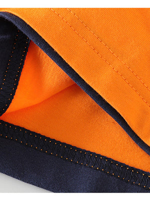 Toddler orange cotton tee with navy trim and stitching detail