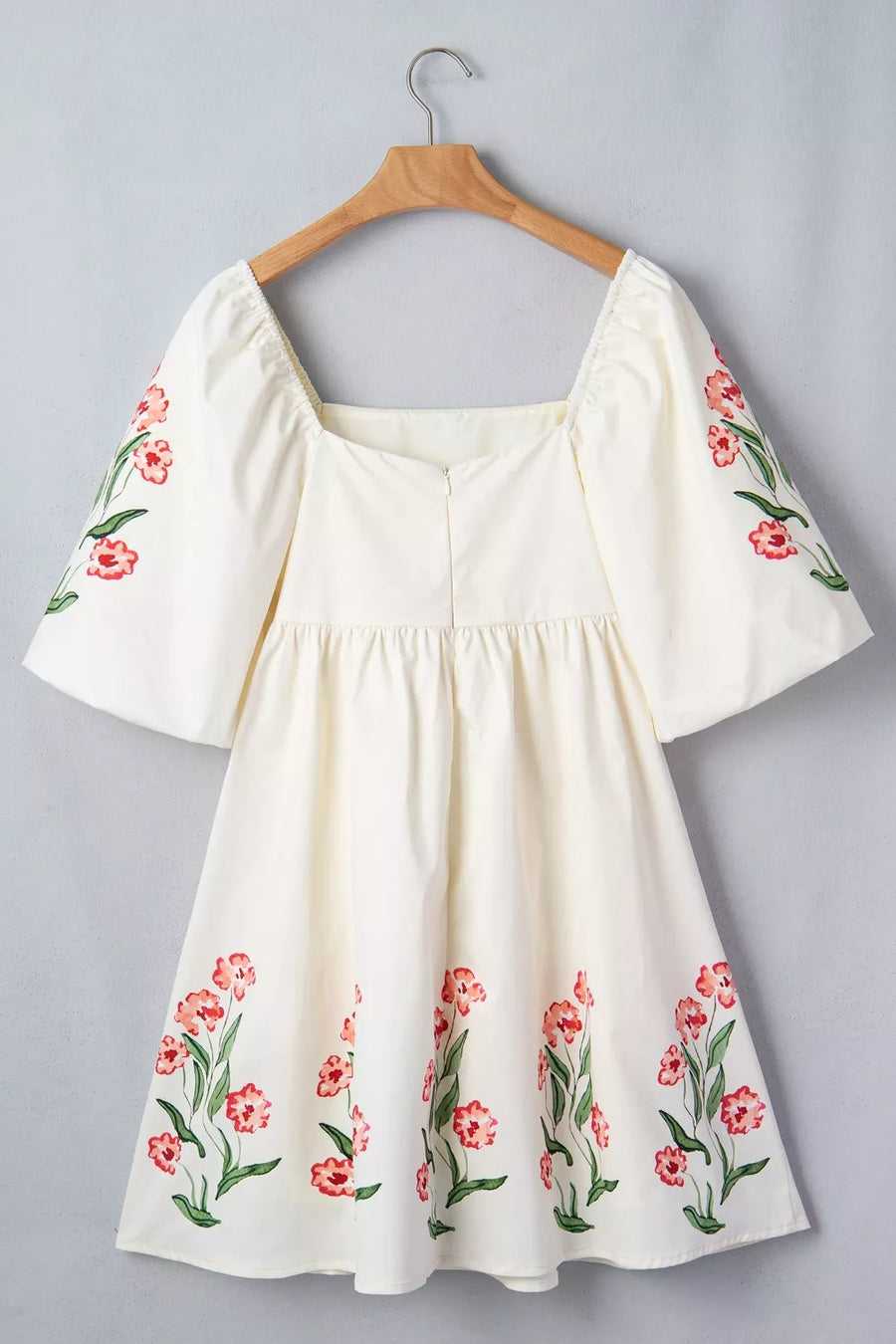 Cream floral puff sleeve square neck A-line dress with embroidered flowers.