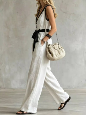White jumpsuit with full-length and button-front