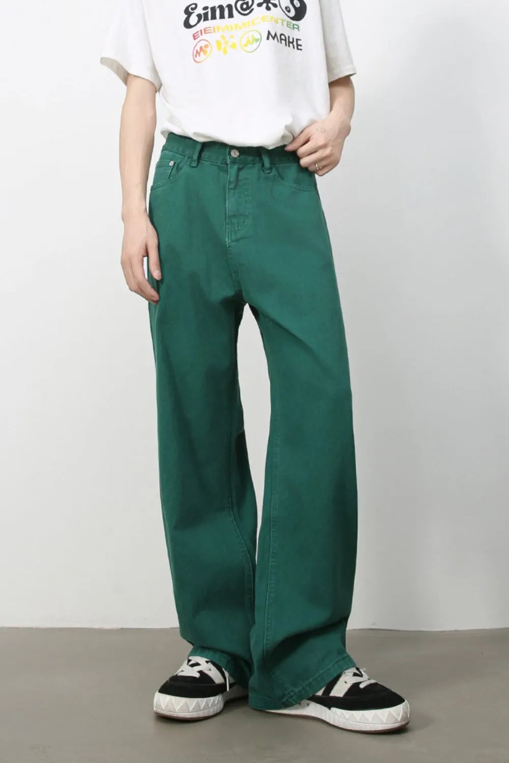 Dark green rigid denim wide-leg trousers with a casual fit.