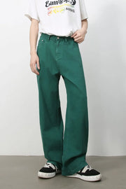 Dark green rigid denim wide-leg trousers with a casual fit.