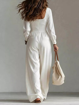 100% polyester Care instructions: Machine wash cold jumpsuit in White with relaxed silhouette