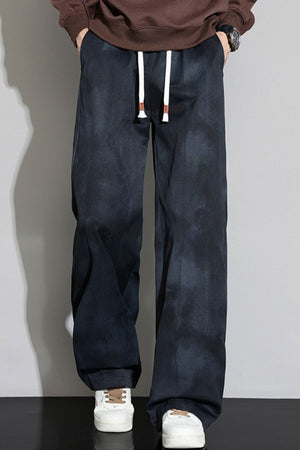 Black relaxed fit sweatpants with cloud pattern and white drawstring.