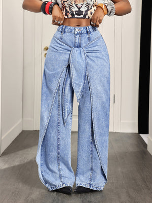 85% cotton, 15% polyester Care instructions: Machine wash cold wide-leg jeans in light blue with flared silhouette