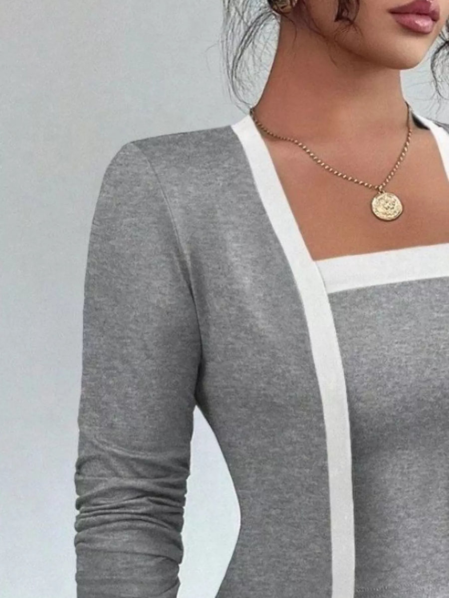 Gray two-piece cardigan set with white trim and long sleeves.