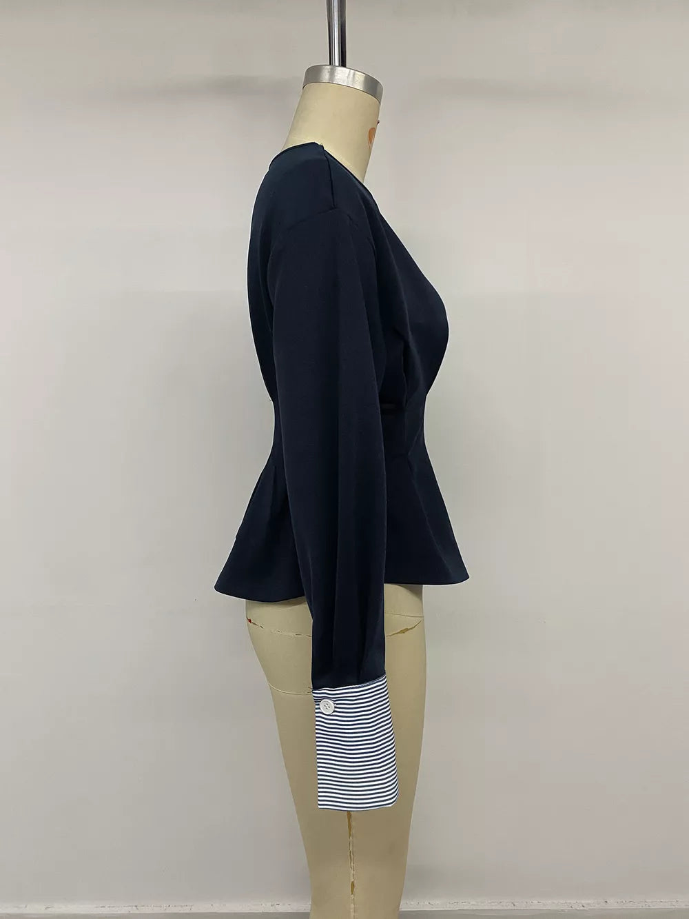 Round Neck Peplum Top With Striped Cuffs in Dark Blue with buttoned cuffs