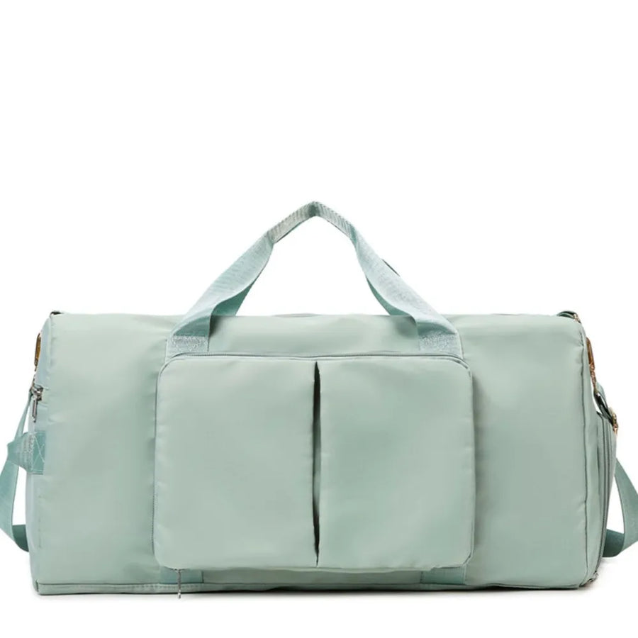 Sport Luxe Weekend Holdall gym duffel bag in Gum Leaf green with two front pockets and dual handles.