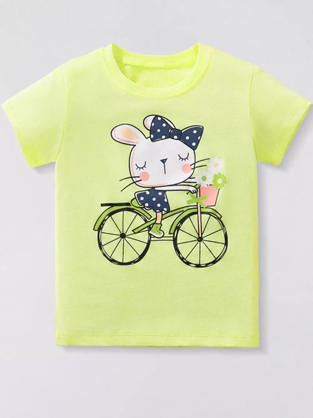 Kids' lime green t-shirt with a graphic of a bunny riding a bicycle.