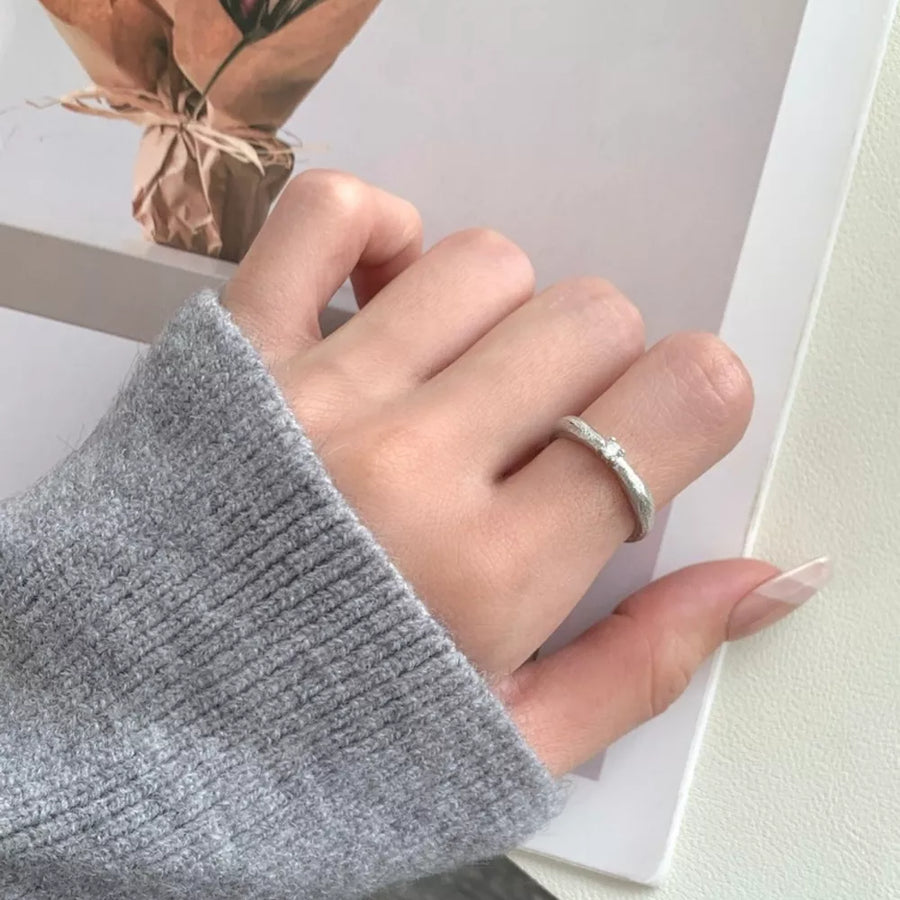 925 sterling silver,Zircon Care instructions: Avoid wearing during exercise, as ring in clear with curved silhouette