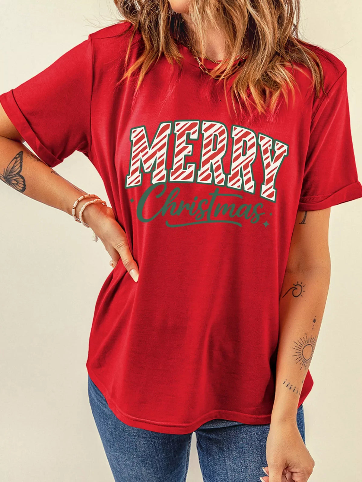 Red graphic tee with Merry Christmas text, short sleeves, crew neck, casual fit