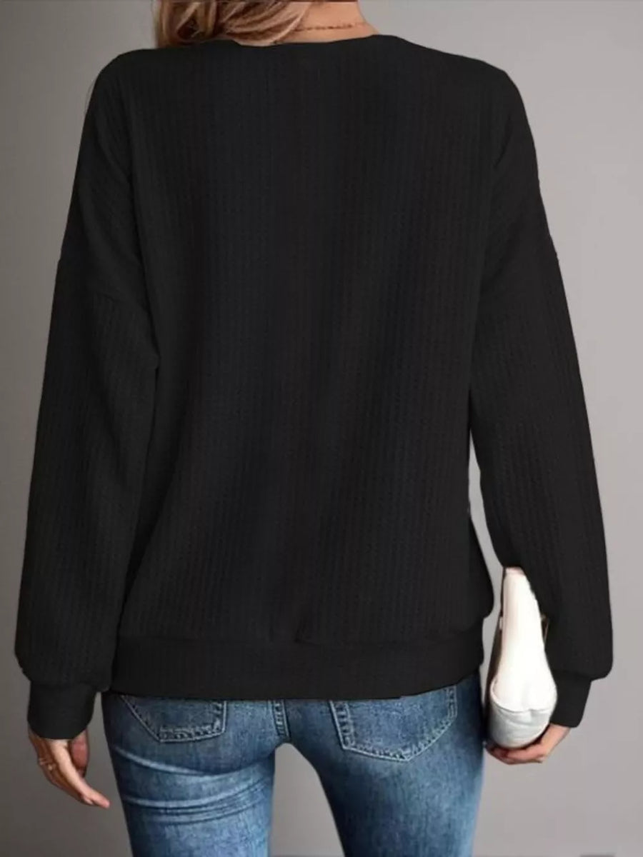 100% polyester Care instructions: Machine wash cold t-shirt in Black with relaxed silhouette