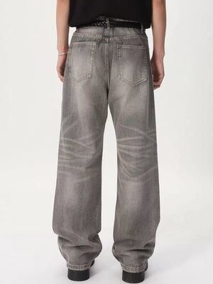 Men's vintage wash wide leg jeans in gray cotton with a relaxed fit.