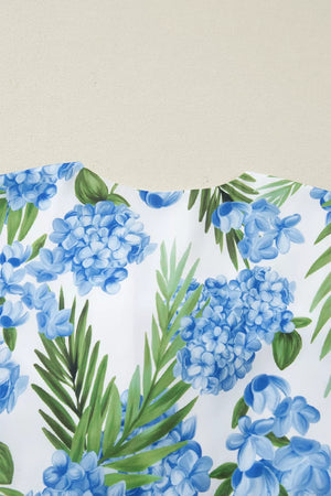 Ruffled mini dress with blue hydrangea and palm print, white background