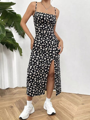 Black Flower spaghetti strap midi dress with a high slit and daisy print.