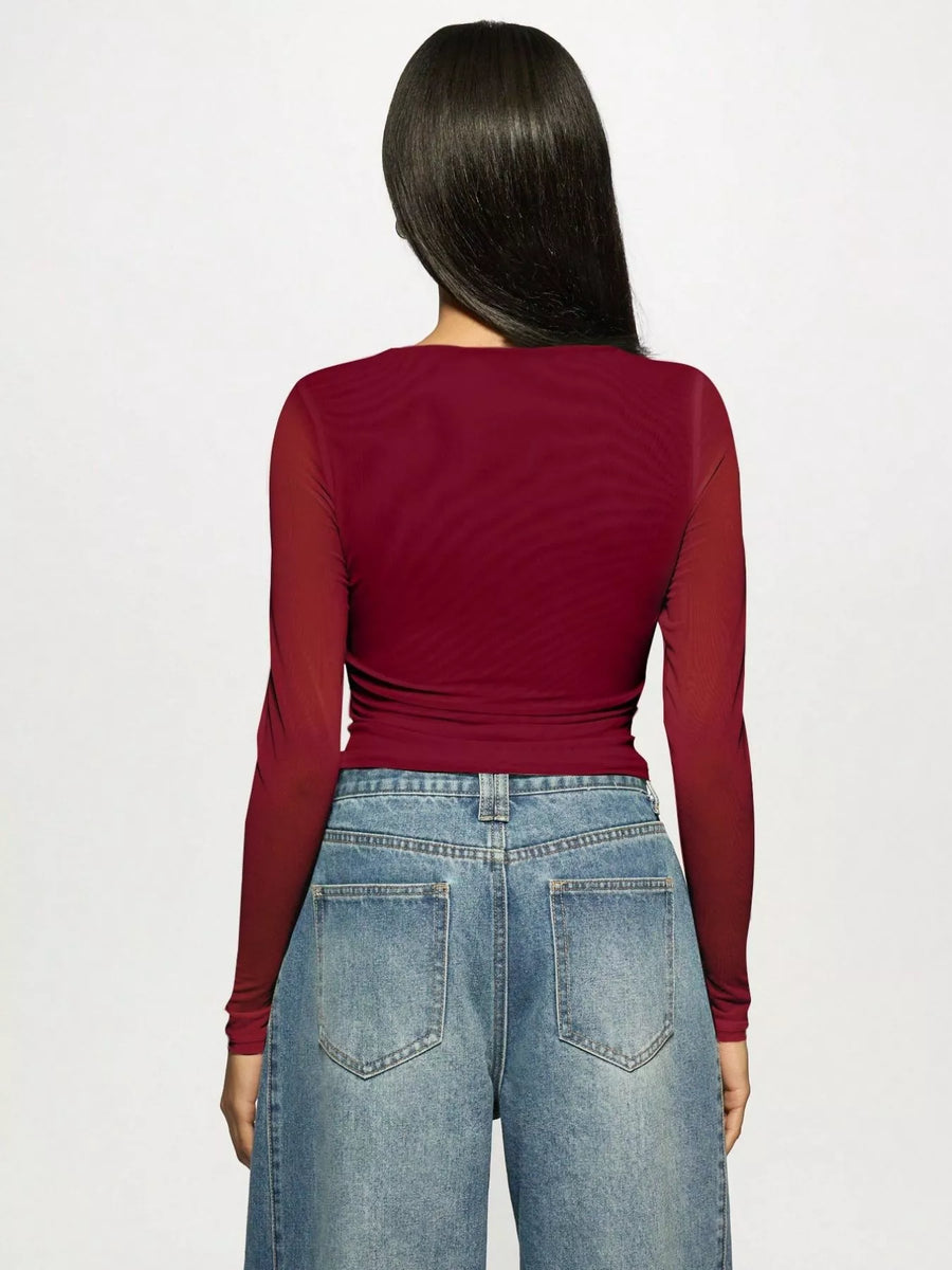 Burgundy mesh long-sleeve t-shirt with rhinestone detail, shown from the back.