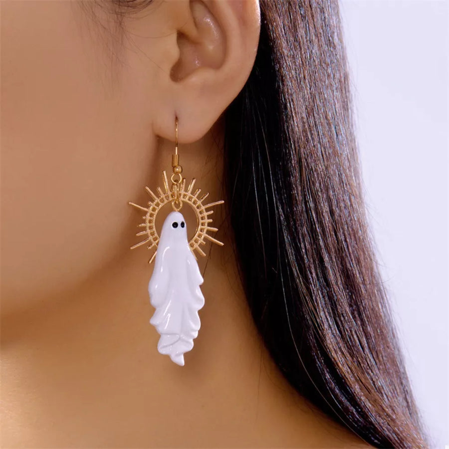 gold earrings featuring ghost motif and novelty