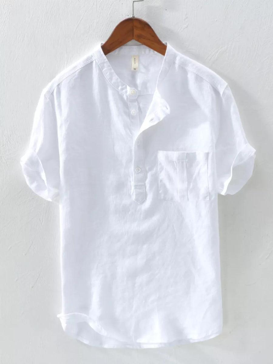 Men's white cotton blend band collar shirt with button detail and chest pocket.