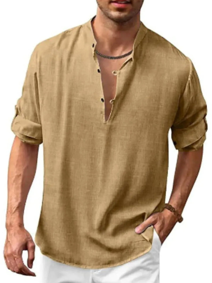 Khaki half-button shirt with rolled sleeves and band collar.