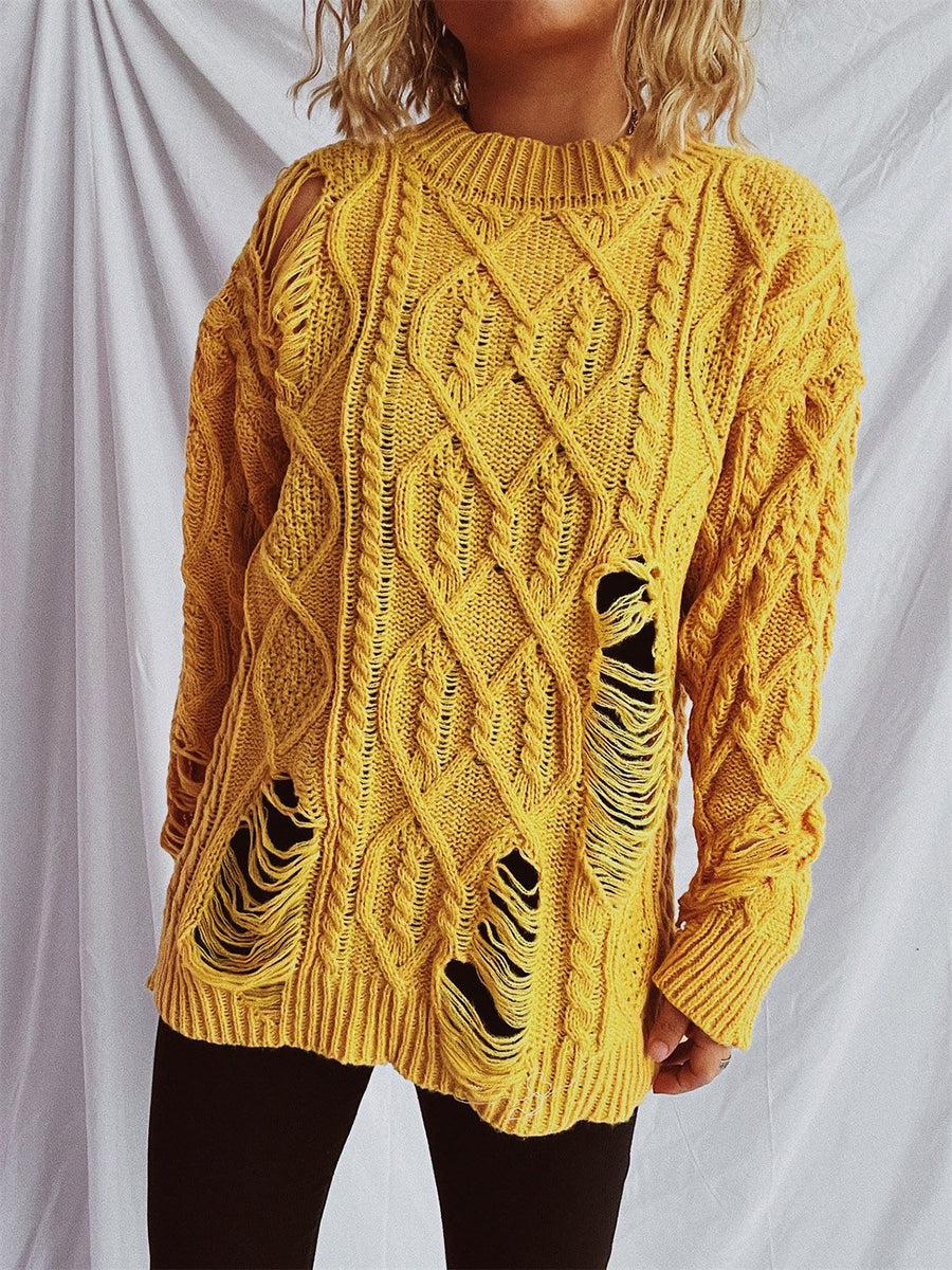 Mustard yellow distressed cable knit sweater with ripped details